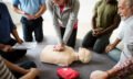 Group of diverse people in cpr training class