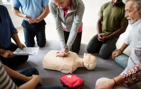 Group of diverse people in cpr training class